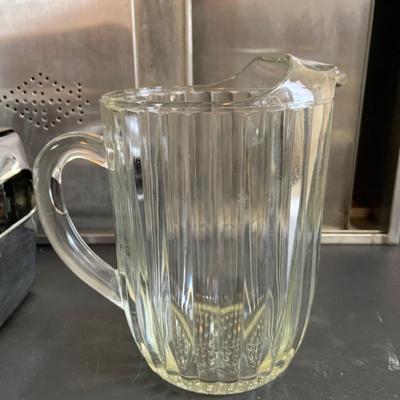 LOT 257: Diner Collection Includes Vintage Napkin Dispenser, Salt and Pepper Shakers, Vintage Alunimum Bread Box, Pitcher, and More