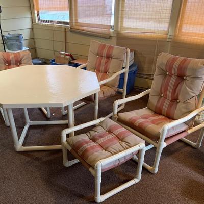LOT 261: Mid Century PVC Patio Furniture Including Octogon Table, a Reclining Chair and Ottoman and Two Arm Chairs