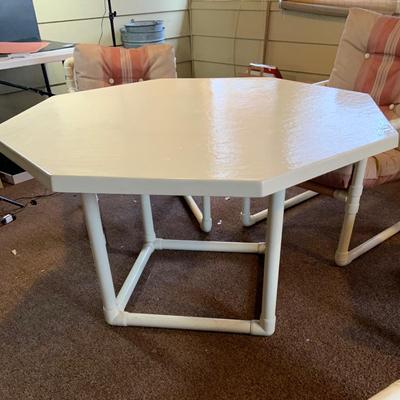 LOT 261: Mid Century PVC Patio Furniture Including Octogon Table, a Reclining Chair and Ottoman and Two Arm Chairs