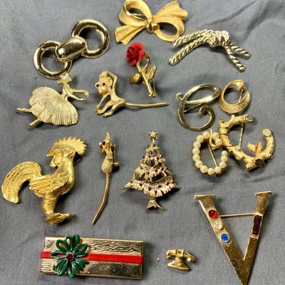 LOT 267: Whimsical Collection of Goldtone Brooches and Pins Including Holiday and More