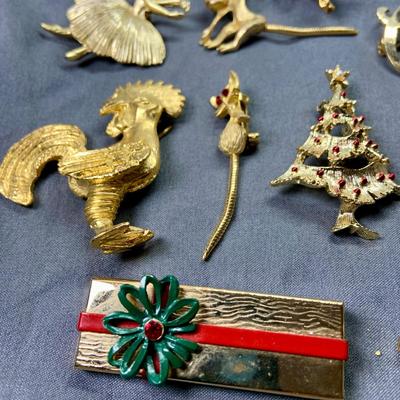 LOT 267: Whimsical Collection of Goldtone Brooches and Pins Including Holiday and More