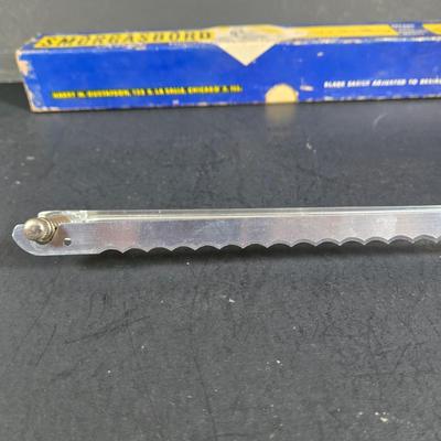 LOT 271: Vintage 1960s Jeanette Blue Corinthian Shot Glasses with Brass Caddy, "HOME SMORGASBORD KNIFE", Vintage Imperial Glass...