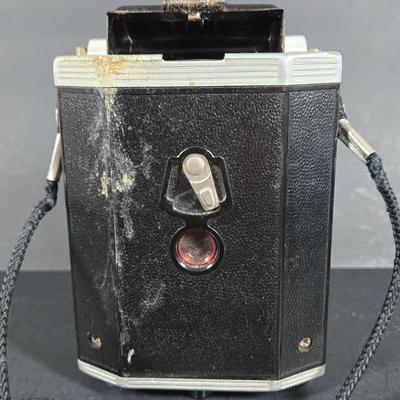 LOT 275: Kodak BROWNIE REFLEX SYNCHRO MODEL Camera and Vintage WOLLENSAK 8MM MAGAZINE MODEL 73 MOVIE CAMERA ; Both Untested