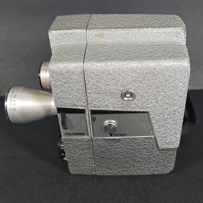 LOT 275: Kodak BROWNIE REFLEX SYNCHRO MODEL Camera and Vintage WOLLENSAK 8MM MAGAZINE MODEL 73 MOVIE CAMERA ; Both Untested