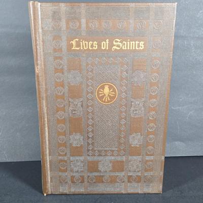 LOT 280: "LIVES OF SAINTS" Book, Memorial Edition HOLY BIBLE in Wooden Box, and Vintage 1960S Last Supper Wall Tapestry