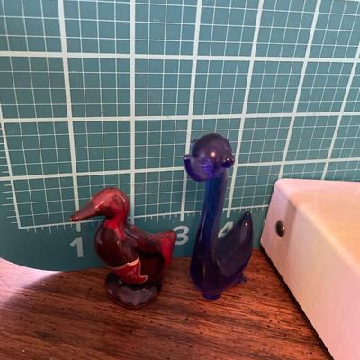 Glass birds and books