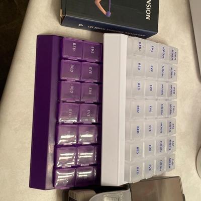 Pill holders, yoga belt and blood pressure