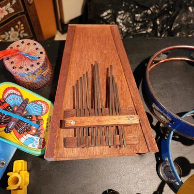 Large Box filled with Assorted Instruments & Music Books Yamaha Recorder , Harmonicas , Symbols, and many others