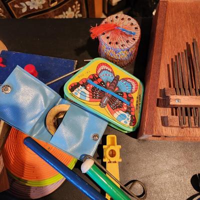 Large Box filled with Assorted Instruments & Music Books Yamaha Recorder , Harmonicas , Symbols, and many others