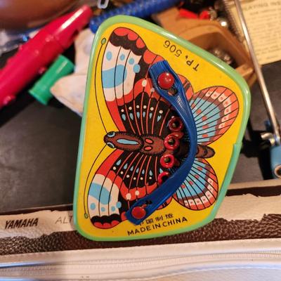 Large Box filled with Assorted Instruments & Music Books Yamaha Recorder , Harmonicas , Symbols, and many others