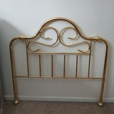 Queen Sized bed with decorative brass headboard