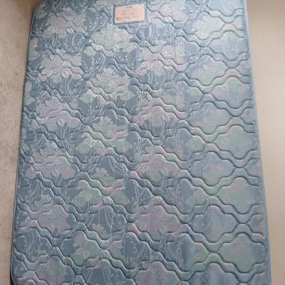 Queen Sized bed with decorative brass headboard