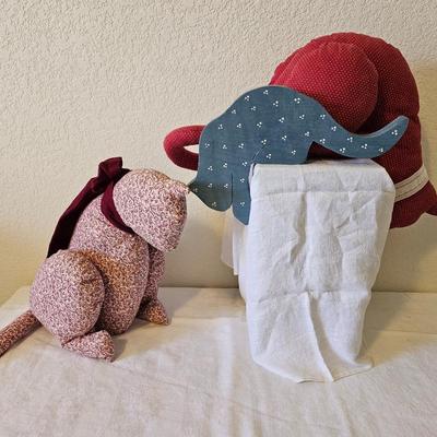 Two handmade cloth cats and a wooden shelf sitting cat
