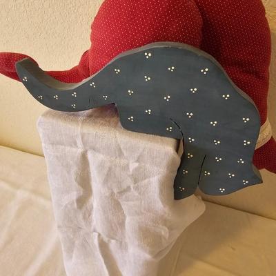 Two handmade cloth cats and a wooden shelf sitting cat