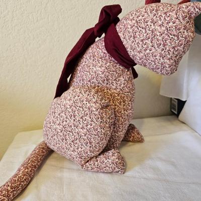 Two handmade cloth cats and a wooden shelf sitting cat