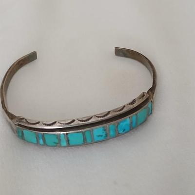 Antique Native American Zuni sterling silver cuff bracelet with flush turquoise channel inlay