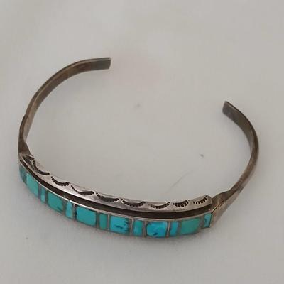 Antique Native American Zuni sterling silver cuff bracelet with flush turquoise channel inlay