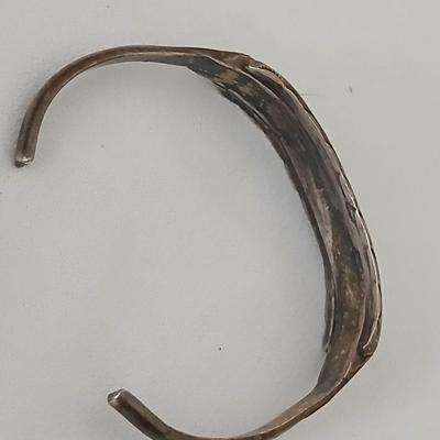 Antique Native American Zuni sterling silver cuff bracelet with flush turquoise channel inlay