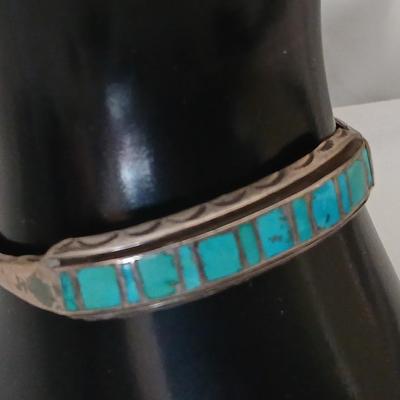 Antique Native American Zuni sterling silver cuff bracelet with flush turquoise channel inlay