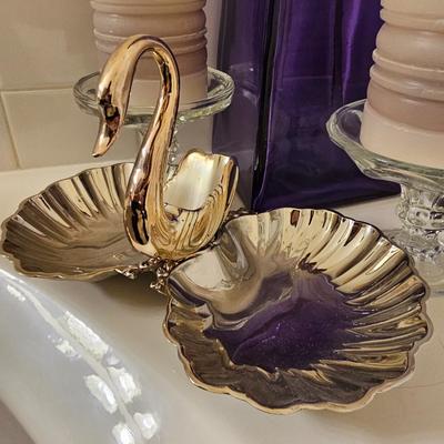 Large purple glass vase with two candles and a double dish silver tray swan dish