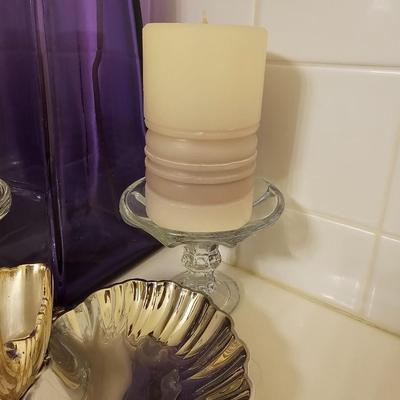 Large purple glass vase with two candles and a double dish silver tray swan dish