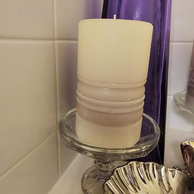 Large purple glass vase with two candles and a double dish silver tray swan dish