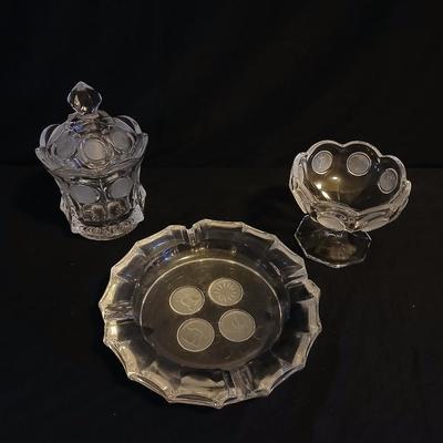 Three pieces of Fostoria glassware candy dish and Fostoria crystal pedestal dish and Fostoria Ashtray