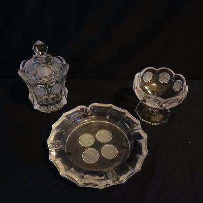 Three pieces of Fostoria glassware candy dish and Fostoria crystal pedestal dish and Fostoria Ashtray