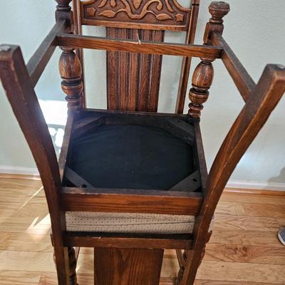 Antique English Jacobean Revival Oak table with pull out end leaves and six chairs