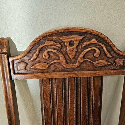 Antique English Jacobean Revival Oak table with pull out end leaves and six chairs