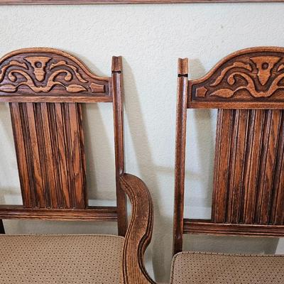 Antique English Jacobean Revival Oak table with pull out end leaves and six chairs