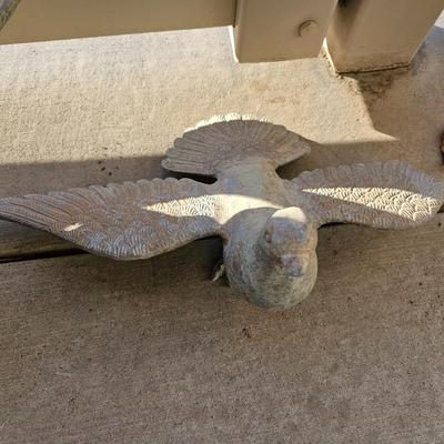 Two light metal Yard doves