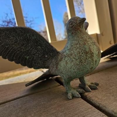 Two light metal Yard doves