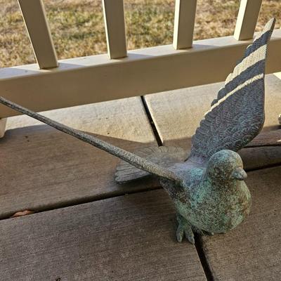 Two light metal Yard doves