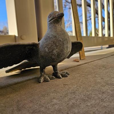 Two light metal Yard doves