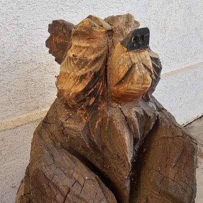 20" tall Adorable wood carved bear in a log