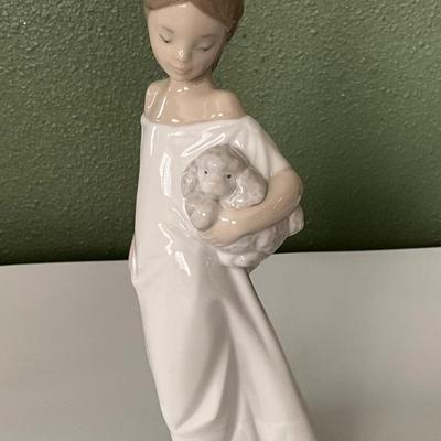 NAO Lladro Lady Holding Poodle