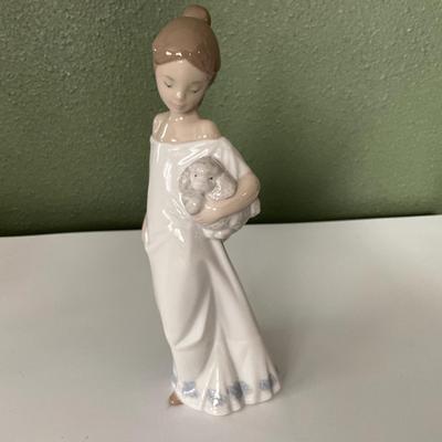 NAO Lladro Lady Holding Poodle
