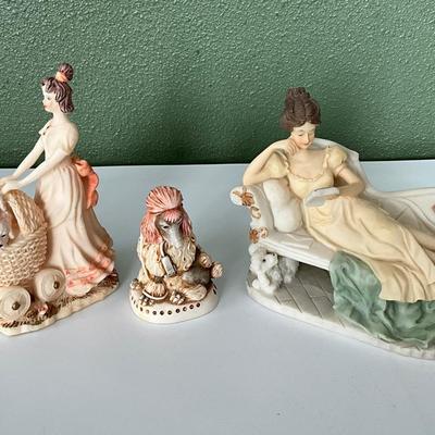 LaVerona Collection Lady on Chase Lounge and Lady pushing poodles