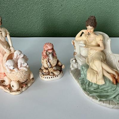 LaVerona Collection Lady on Chase Lounge and Lady pushing poodles