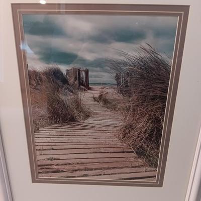 GILL COPELAND FRAMED PHOTO OF BEACH SCENE AND FAUX PLANT IN METAL VASE