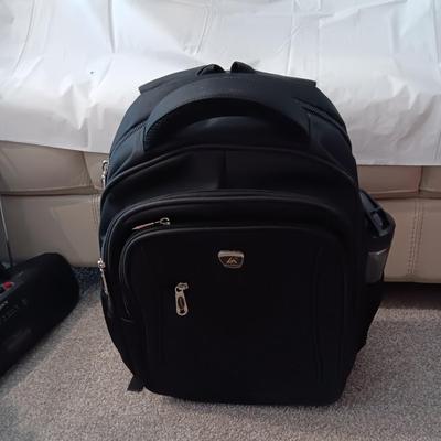 HUANLV TROLLEY BACKPACK, SONY RADIO ALARM CLOCK AND A SMALLER SUITCASE ON 4 WHEELS
