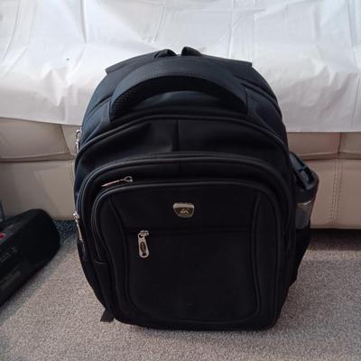 HUANLV TROLLEY BACKPACK, SONY RADIO ALARM CLOCK AND A SMALLER SUITCASE ON 4 WHEELS
