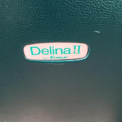 LARGE DELINA II HARDSIDE SUITCASE ON 4 WHEELS AND A CARRY ON WITH 2 WHEELS