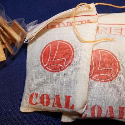 MODEL TRAIN COLLECTIBLES. LIONEL TRAIN BAGS OF COAL, BILLBOARD SIGNS AND TRACK POST SIGNS