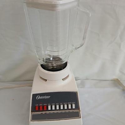 Oster 10 function blender with glass pitcher and a Hamilton Beach electric knife