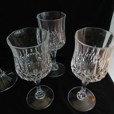 Set of 6 heavy glass stemware wine glasses and two matching crystal champagne glasses
