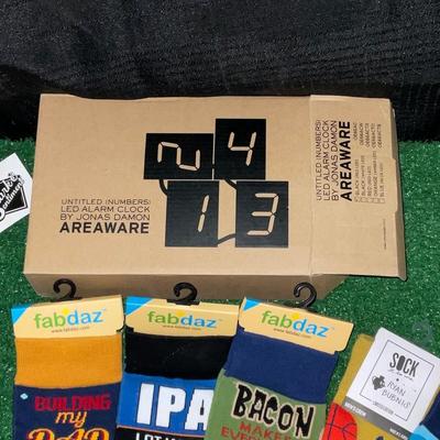 G206–Socks, Fargo banner sign, alarm clock