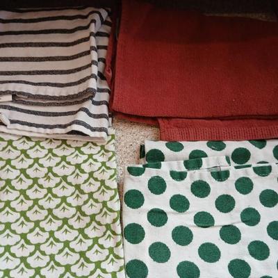 Assortment of coasters and kitchen hand towels with a few crocheted dish cloths