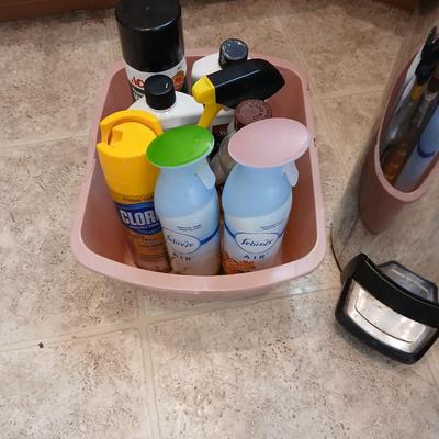 Chrome trash can double organizer with household cleaning chemicals - brushes and sponges